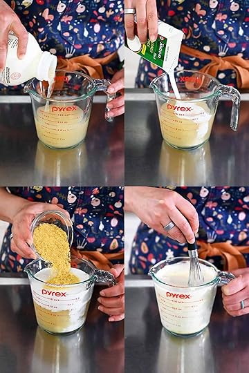 Four sequential photos that show someone mixing the sauce in a 2-cup Pyrex measuring cup by adding chicken broth, coconut milk, and nutritional yeast and whisking until uniform.
