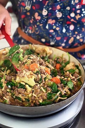 A closeup of the ground beef, potato, and mixed vegetable skillet with the baby spinach wilted and fully mixed in.