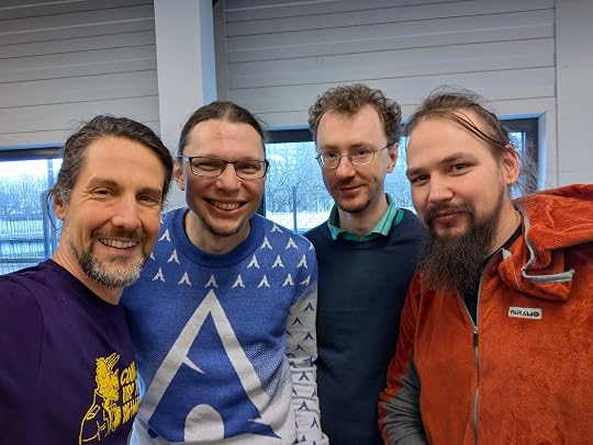 Myself, Arch Project Leader Levente, ArchWiki maintainer Ferdinand, and FSFE's vice president Heiki at FOSDEM 2025 after I handed them over some hacker chocolate