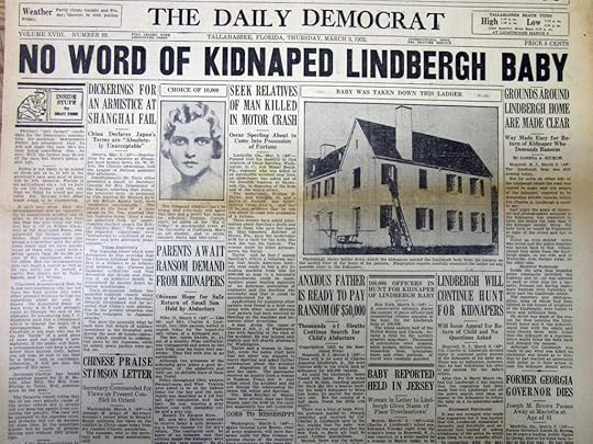 A historical newspaper front page from The Daily Democrat dated March 3, 1932, featuring headlines about the kidnapping of Charles Lindbergh Jr., including details about ransom demands and search efforts.