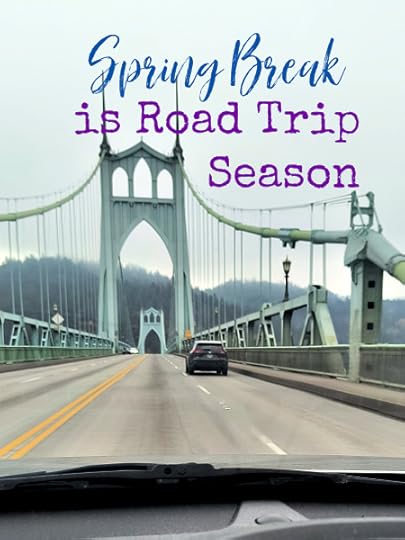 A car drives over the St. John's Bridge in Portland Oregon