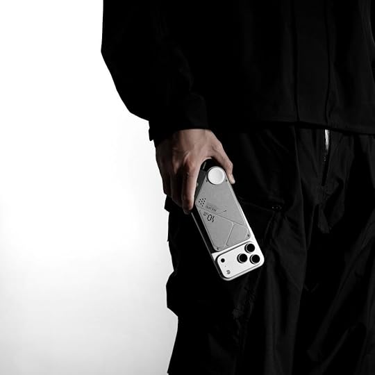 AULUMU M10 Multi-Charging Power Bank on phone being held by man