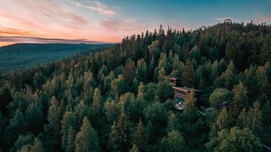 Free from fear and the need to control is represented by a house on a hill in the woods.