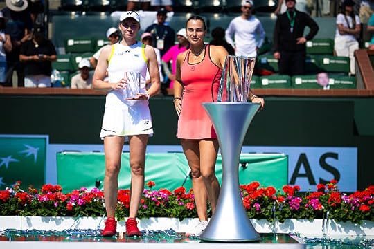 Runner-up Elena Rybakina of Kazakhstan and champion Aryna Sabalenka pose with their trophies after the womens singles final on Day 12 of the BNP...