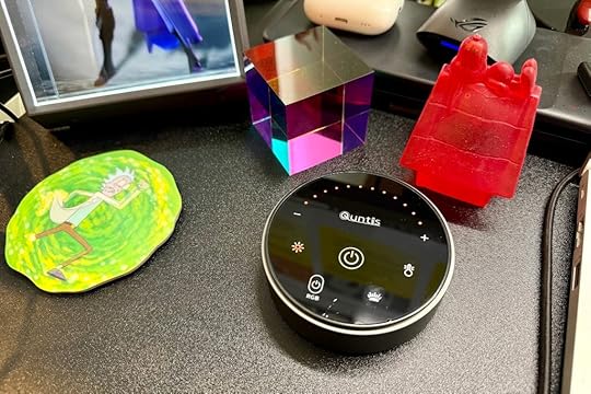 Quntis Monitor Light Bar control puck.