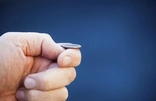 Hand flipping a coin in air to illustrate the issue of AI giving customers different answers to the same prompts.