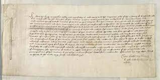 An old handwritten document featuring dense text in a scripted font, likely historical.