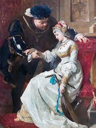 A historical painting depicting a royal couple, with a man in a fur-trimmed cloak seated beside a woman in an elegant white gown and ornate headdress, displaying a moment of affection or conversation.