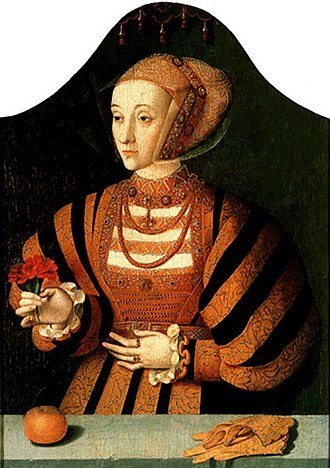 A portrait of a woman in historical attire, wearing a patterned dress with orange and black stripes, holding a flower in one hand and positioned near an orange and a decorative glove on a table.