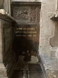 Tomb of Anne of Cleves, Queen of England, with an inscription detailing her birth in 1515 and death in 1557.