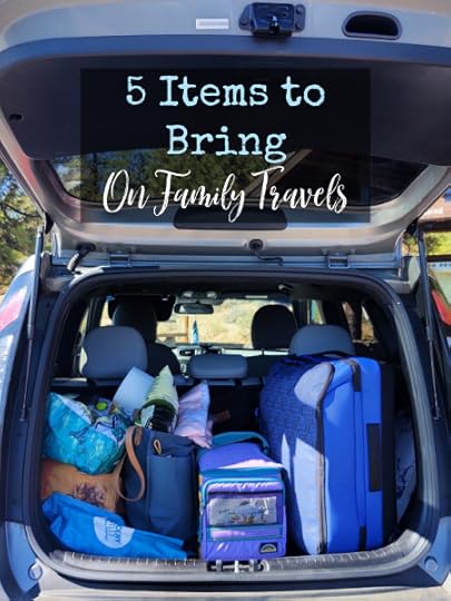 car packed with suitcases and cooler for a road trip