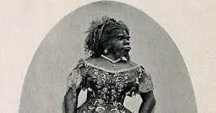 Historical portrait of a woman in an ornate dress, featuring decorative elements and a striking pose, set against a classic background.