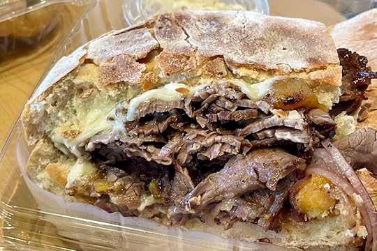 Cuban Cowboy sandwich from Joanna's Marketplace in South Miami with flank steak, grilled onions, sweet plantains, Swiss cheese, and garlic mayo on ciabatta
