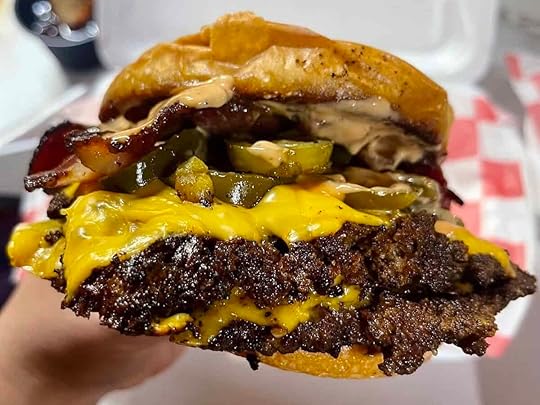 Bacon Jalapeño Double Smash Burger from The Side Chick Food Truck in Miami with melted cheese, beef bacon, and jalapeños