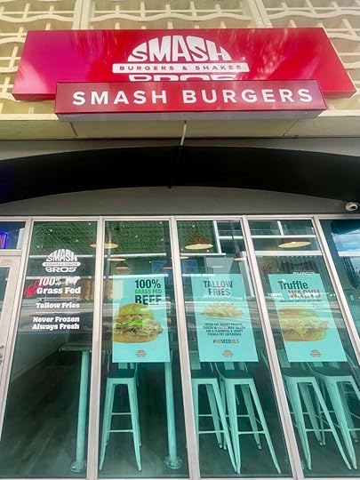 Smash Bros Burgers and Shakes exterior on Biscayne Boulevard in Miami highlighting grass-fed beef and tallow fries signage