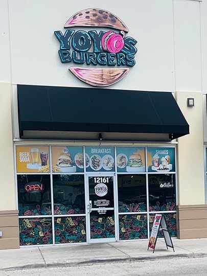 YoYo’s Burgers restaurant exterior in Miami storefront with logo signage