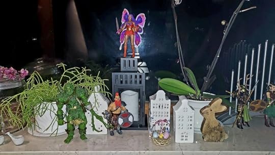 Masters of the Universe New Eternia Moss-Man, Mythic Legions Torgun Redfin, Masters of the Universe Classics Flutterina, Easter basket and wooden bunny.