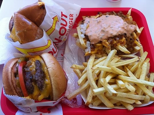 In-N-Out Double-Double burger with Animal Style fries and French fries on a tray