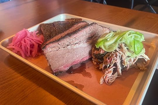La Traila Barbecue brisket, ribs and pulled pork with pickled onions