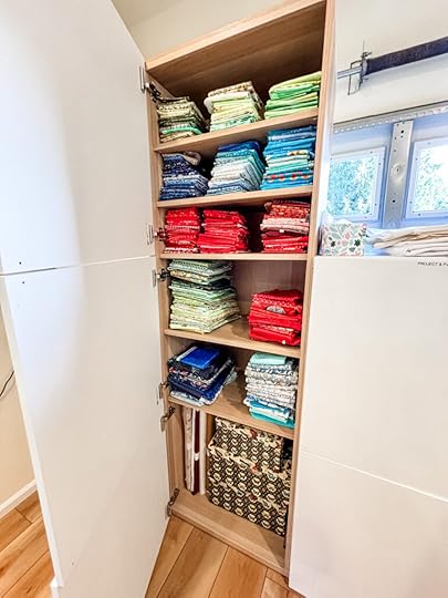 A cabinet for additional storage with farbrics