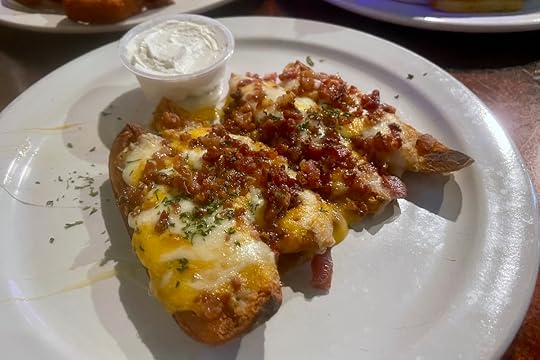 Loaded potato skins with bacon cheese and sour cream at Bryson’s Irish Pub