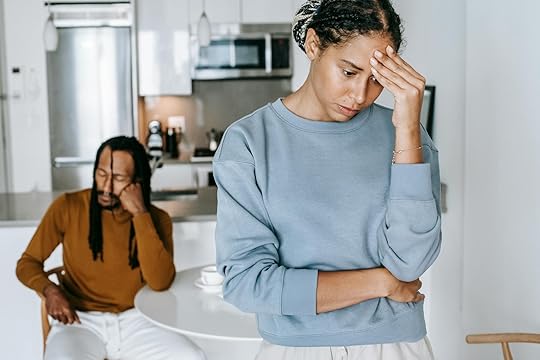 black couple arguing with each other in kitchen - mother emotional burnout invisible load
