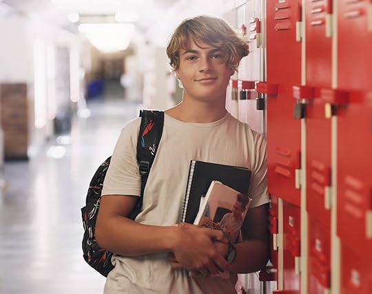 teenager standing by a locker