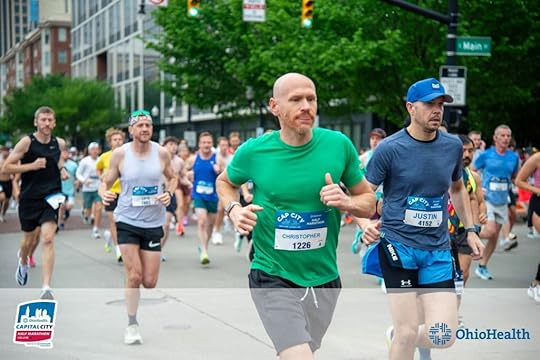 Author Christopher Stollar running the OhioHealth Capital City Half Marathon on April 25, 2026