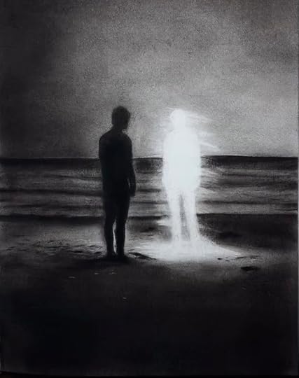 This may contain: two people standing on the beach at night