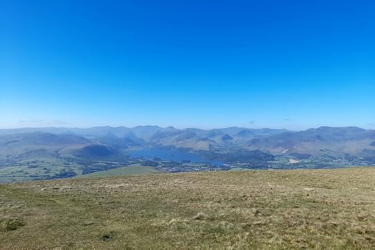 The view from the top of Lonscale Fell. Visible are the Borrowdale Fells, Derwentwater, and the town of Keswick.