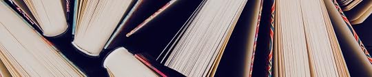 a decorative image of hardback books on their sides.