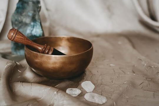 brown wooden bowl on white textile