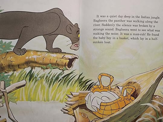 spread from the first story pages of the book, where Bagheera's face is hidden in the middle fold