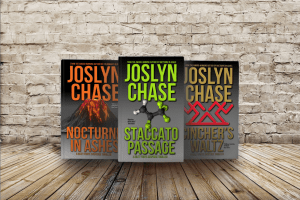 First 3 Riley Forte novels lined up in front of a brick wall--Nocturne in Ashes, Staccato Passage, and Cincher's Waltz, by Joslyn Chase