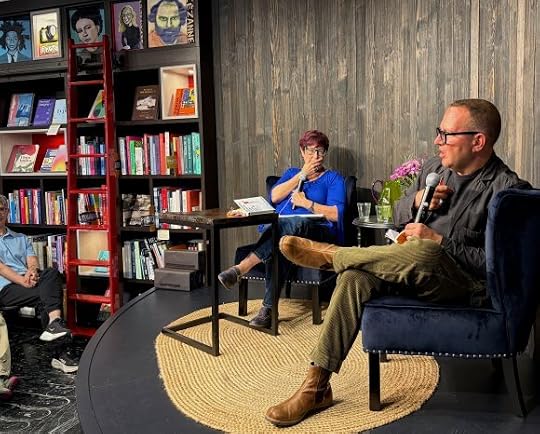 A photo of me with Angie Coiro onstage at Kepler's Books.