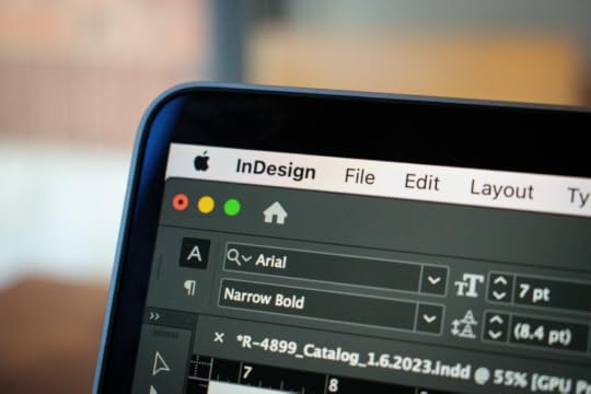 Image: the InDesign application open on a Mac laptop computer