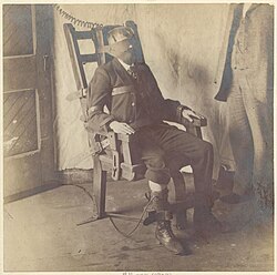 Man in an electric chair, 1908