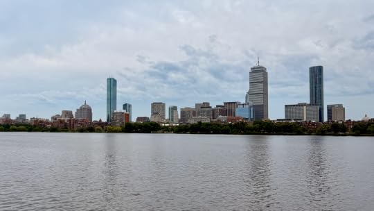 Photograph of the Boston skyline, as seen from the Cambridge side of the Charles River. Centered in the frame are Boston���s three tallest skyscrapers: the John Hancock Tower, the Prudential Tower, and One Dalton tower.
