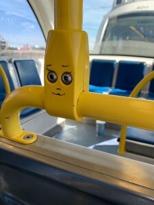 face drawn on bus post