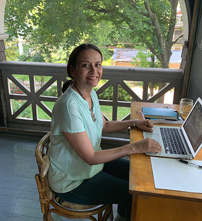 Sujata at her computer