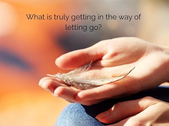 Hands releasing an object into light, symbolizing letting go of doubt