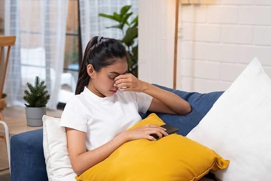 Person using active rest to manage severe vertigo at home