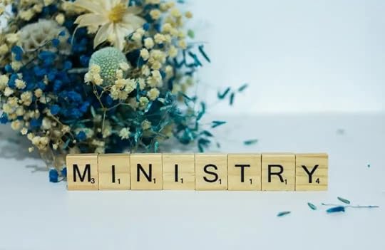 Ministry in tiles with a fall themed background.