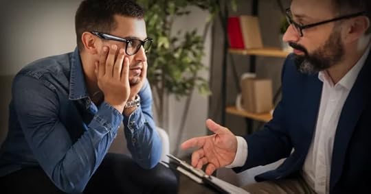 two men engaged in deep discussion