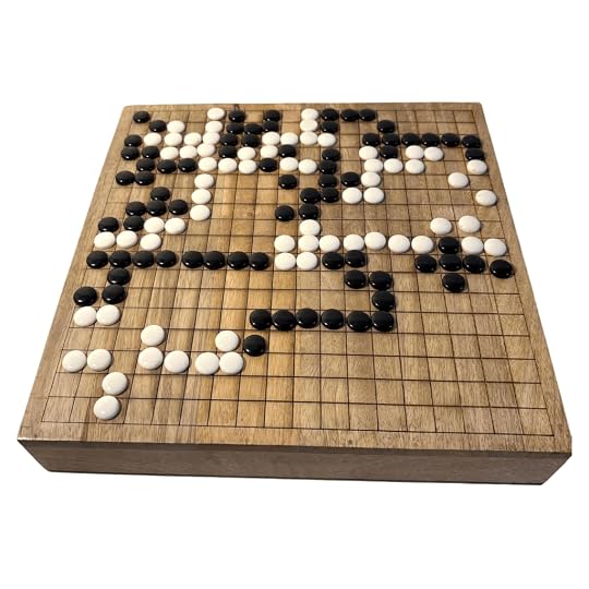 To write my political thriller set in Hong Kong, I had to learn Go on a similar wooden board to this.