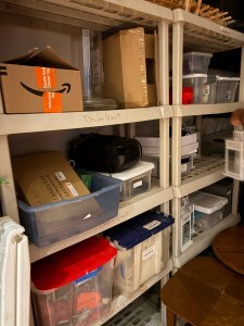 Storage shelf with various boxes