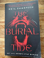 Cover of The Burial Tide by Neil Sharpson, showing a red-on-black image of an animal's snout and open mouth