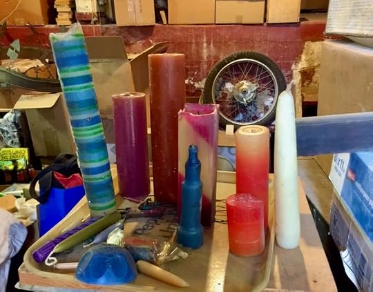 Photo of several pillar candles dating from the 1980s and 1990s.