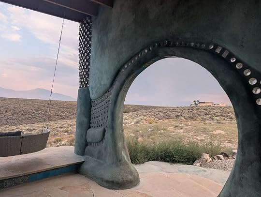 Photo of the outside of an Earthship 
