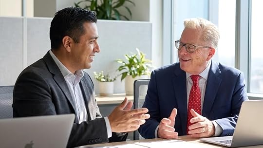 Modern Austin real estate office with professionals reviewing seller financing documents, downtown skyline view